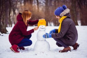 kids playing in the snow in Portugal